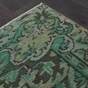 Vintage green and olive Turkish rug with a medallion, hand-knotted, 160 x 262 cm.