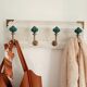 Wall-mounted coat rack in bleached wood and emerald green ceramic hooks –