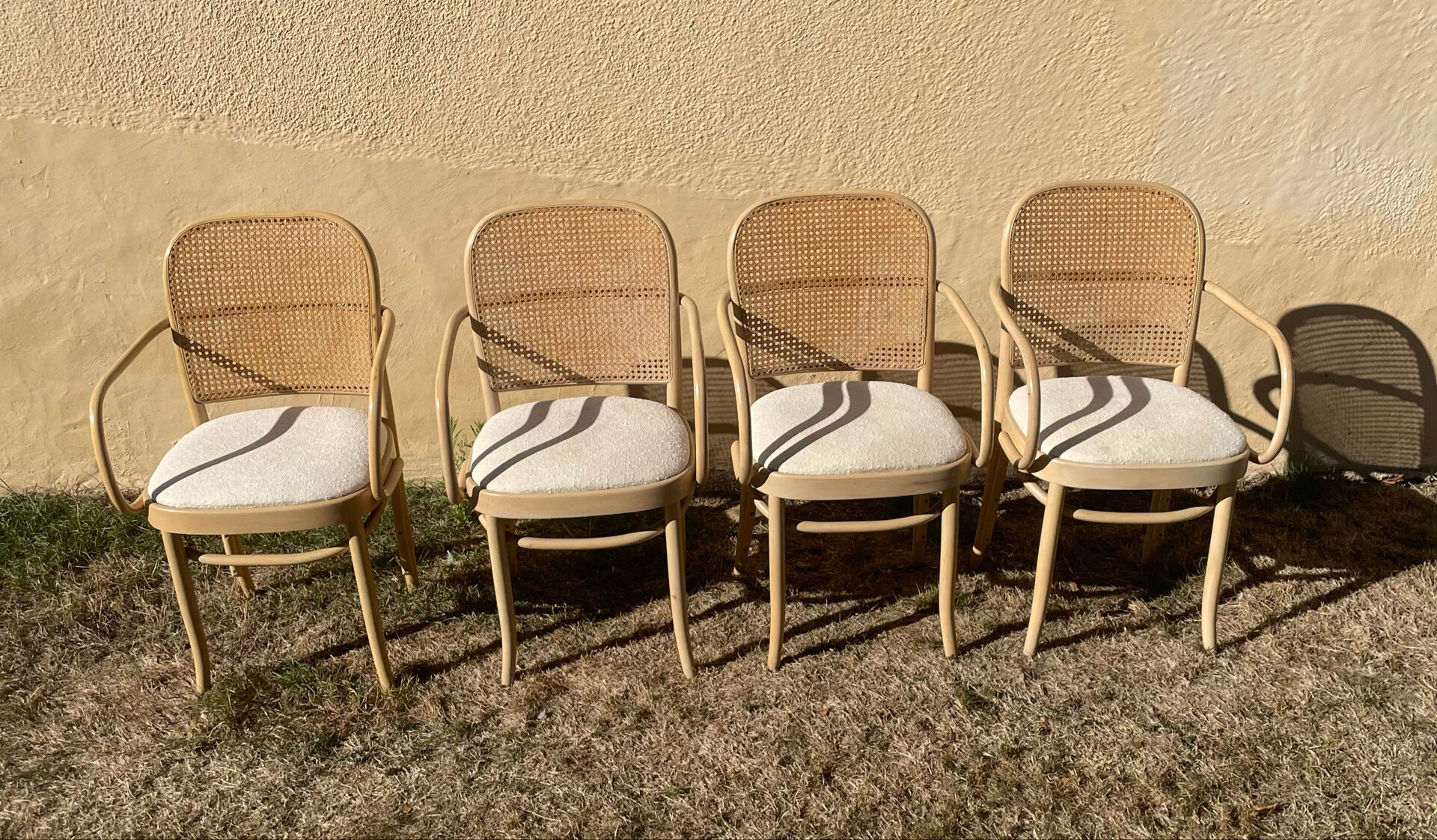 4 curved wooden dining chairs
