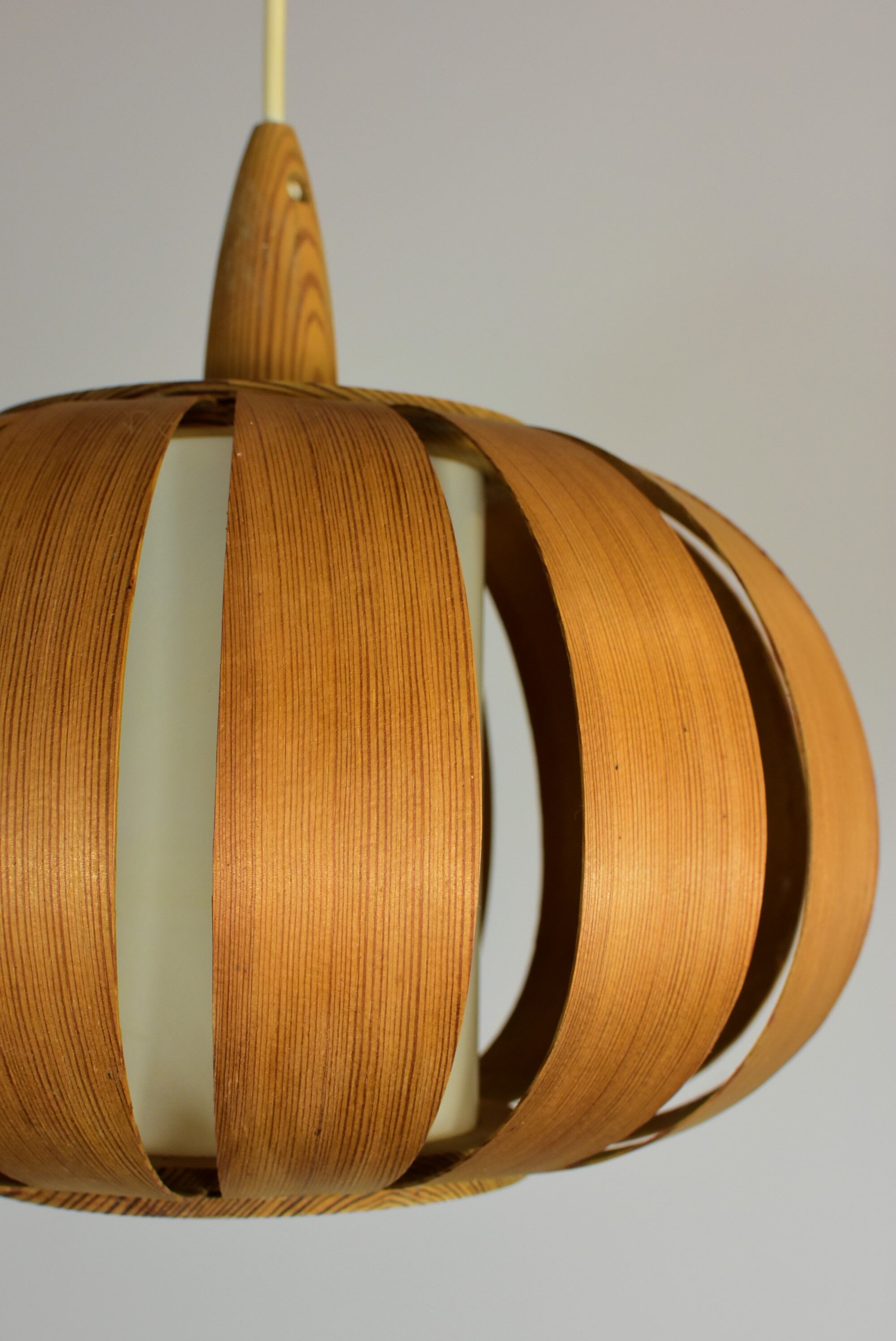 Scandinavian-style wooden pendant light.
