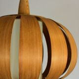 Scandinavian-style wooden pendant light.