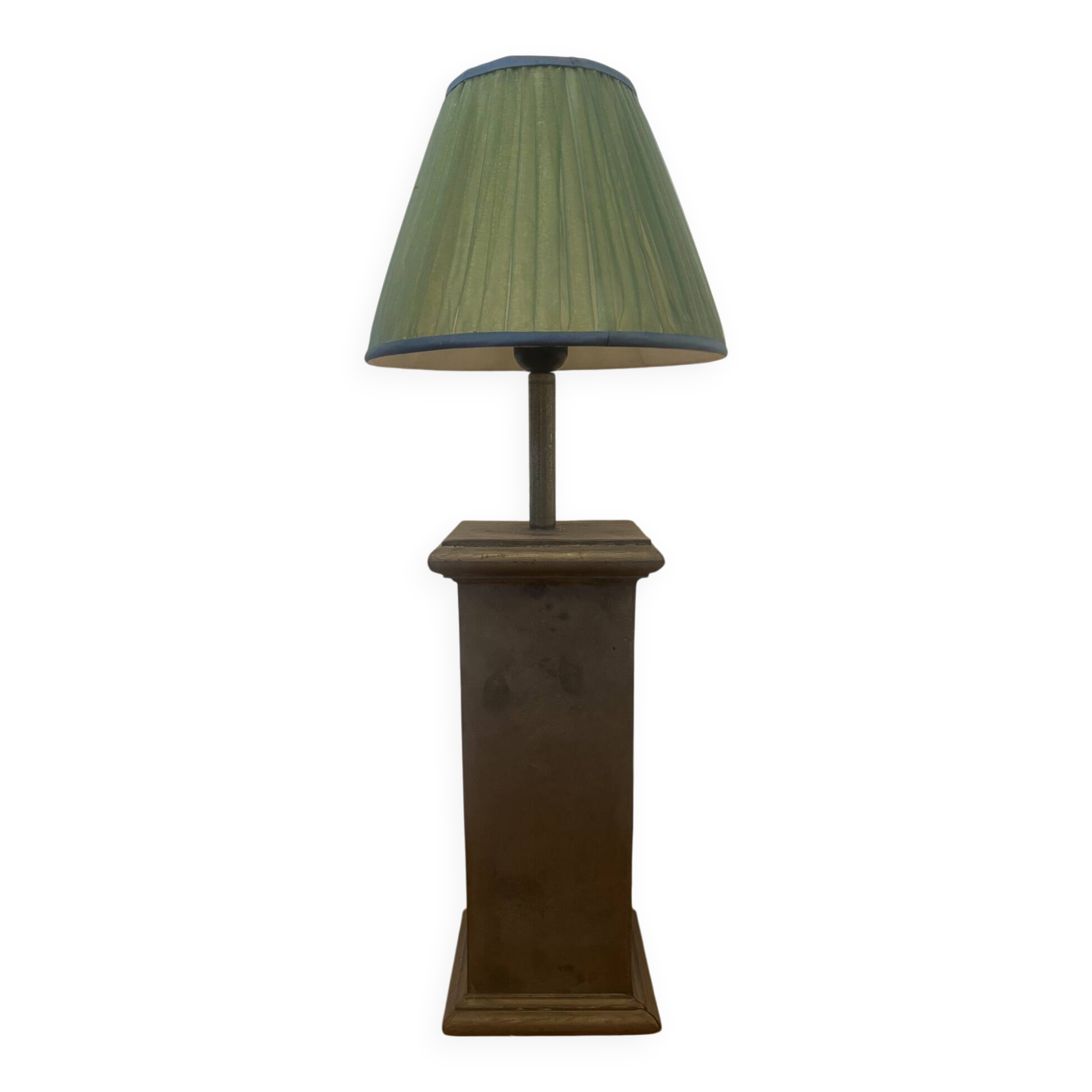 Vintage stone lamp with green pleated shade.