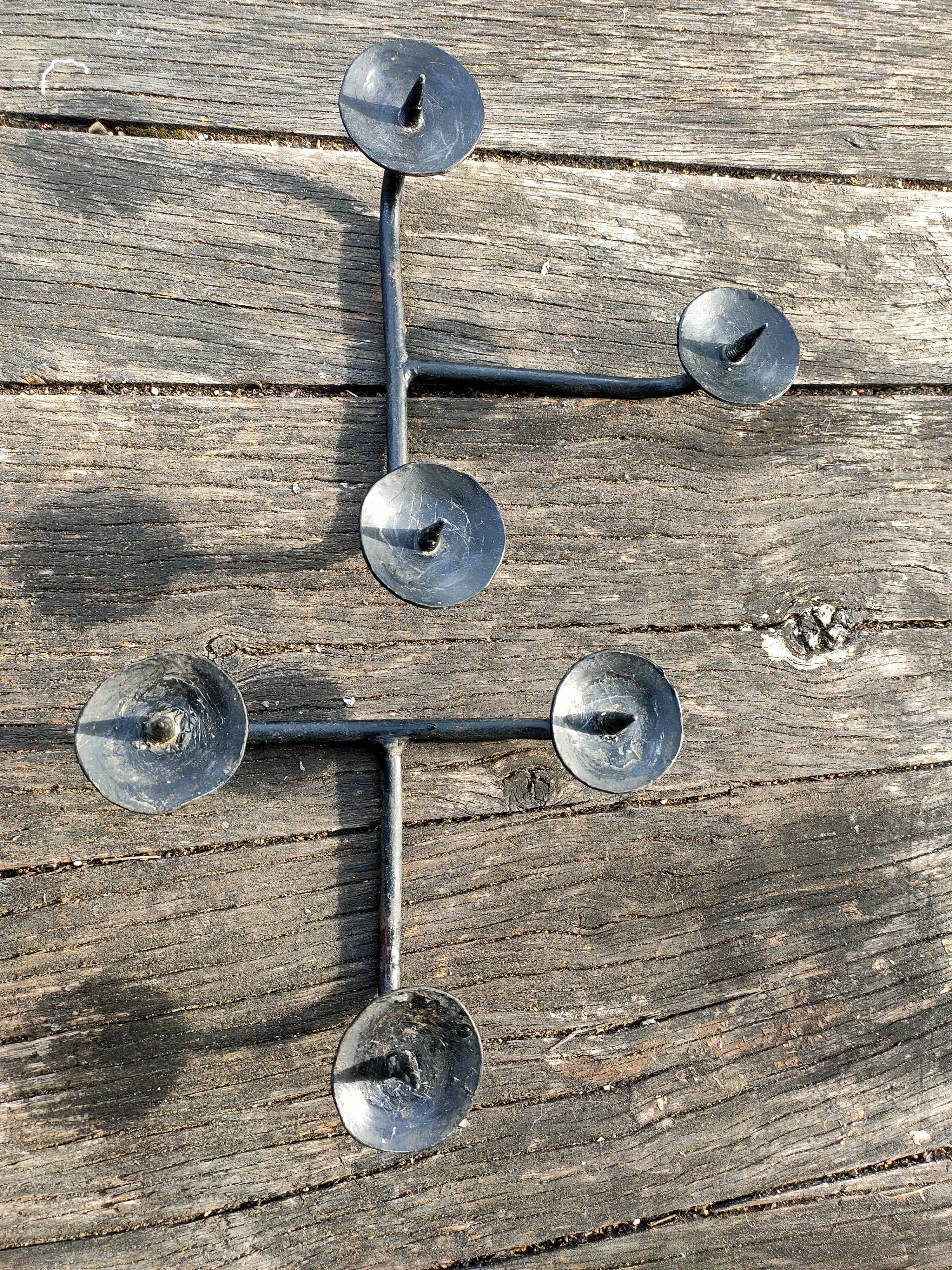 Brutalist cast iron candle holders.