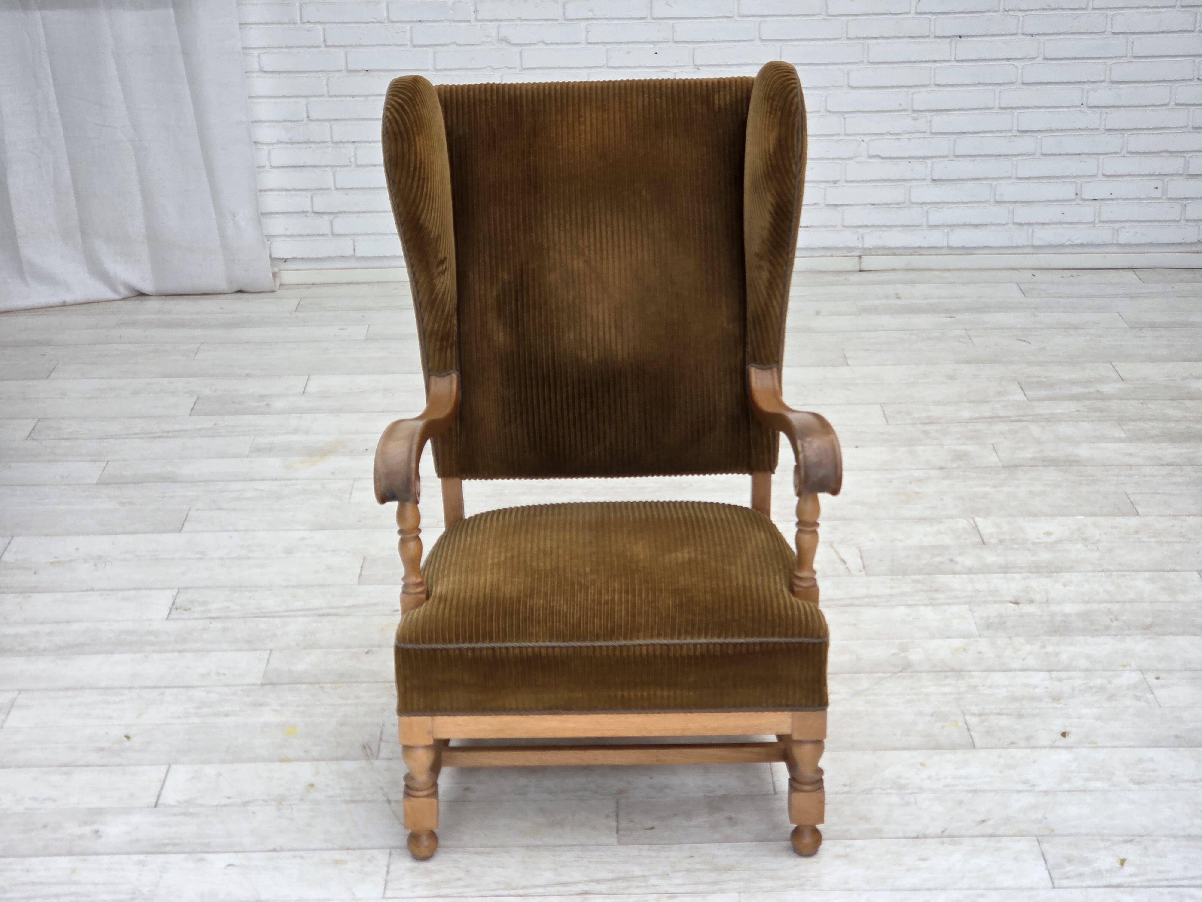 1970s, Scandinavian highback armchair, furniture corduroy, carved oak wood.
