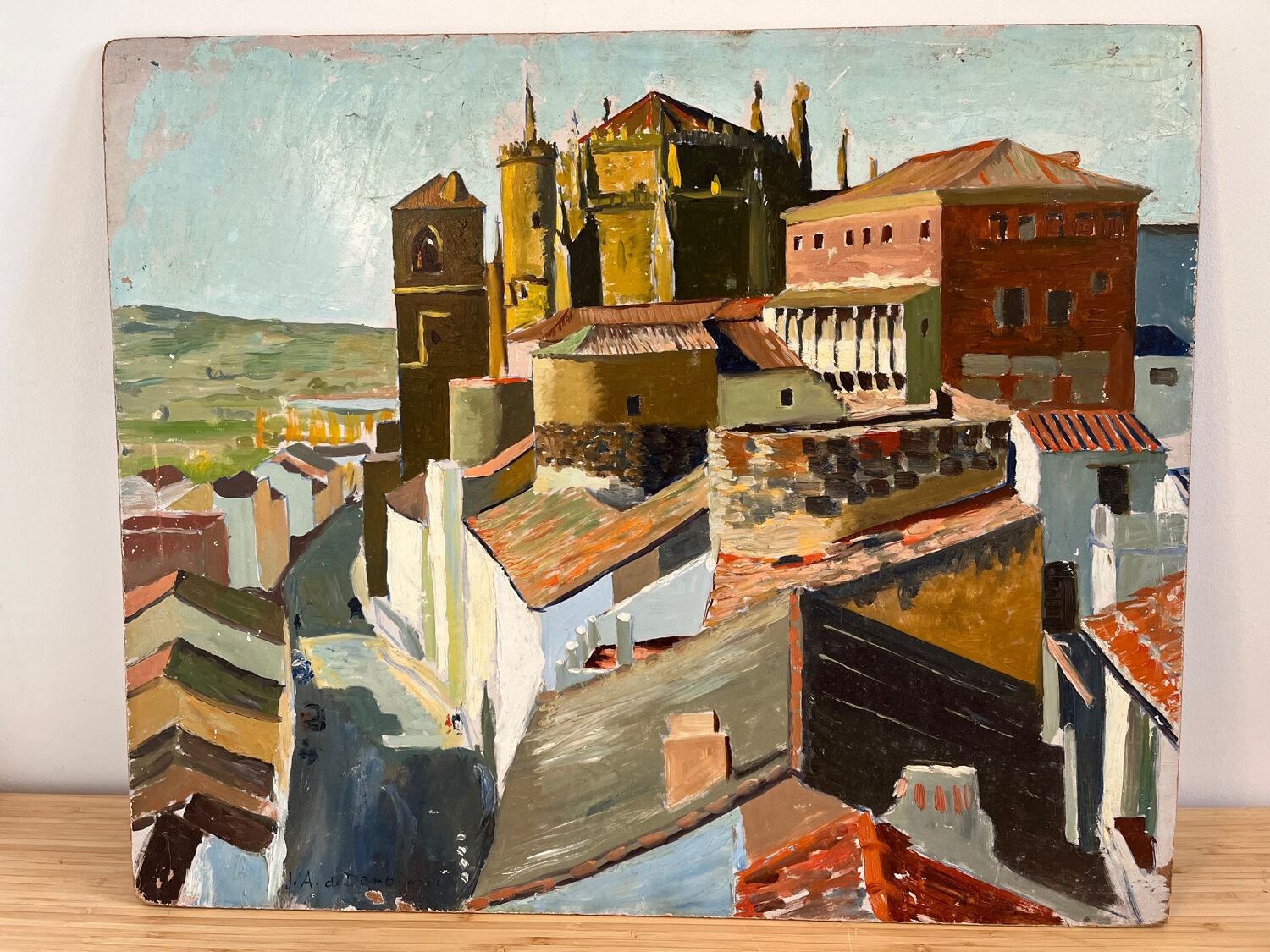 Castle in the rooftops, oil on wood panel, signed JA Dompierre.