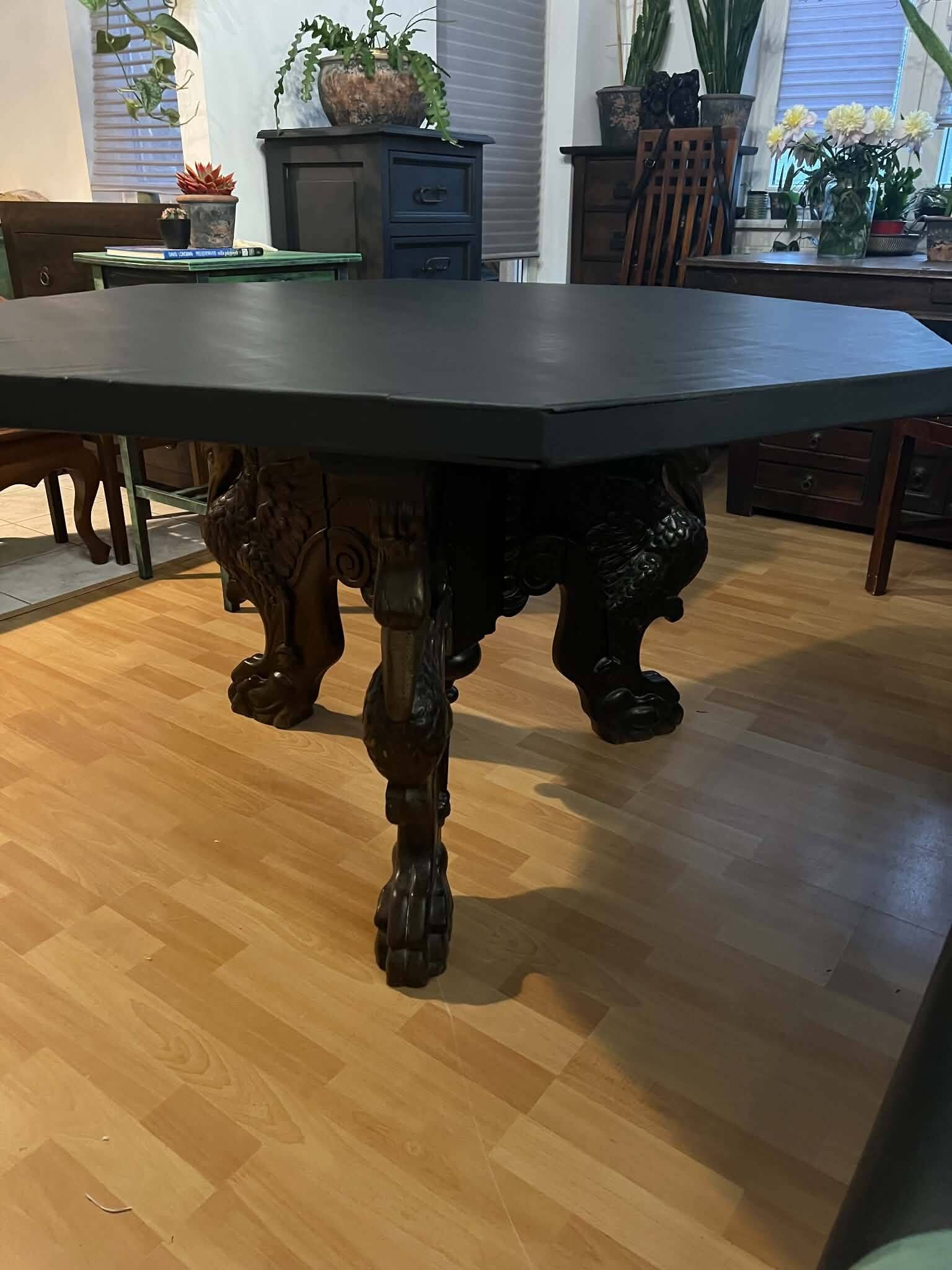Octagonal oak table, 19th century, griffins