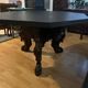 Octagonal oak table, 19th century, with griffins.