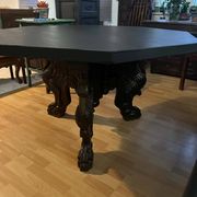 Octagonal oak table, 19th century, griffins