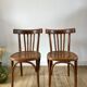 Pair of Baumann curved wood bistro chairs early twentieth century