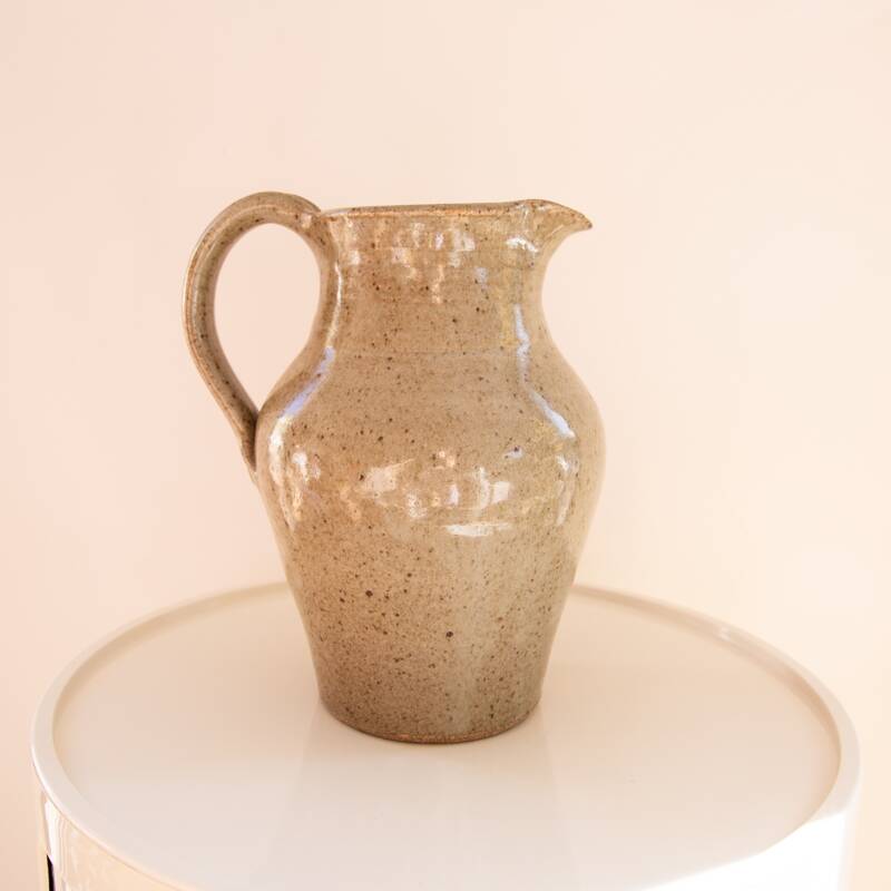 Stoneware carafe signed CA on handle