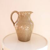 Stoneware carafe signed CA on handle