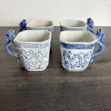 Antique Chinese tea set decorated with dragons.