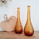 Pair of Italian Empoli vases in amber bubbled glass