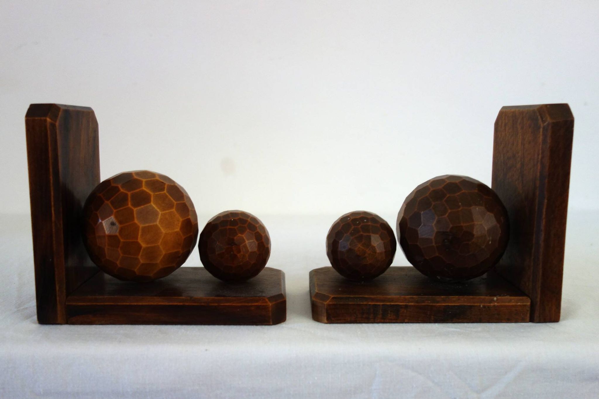 Pair of vintage wooden bookends with faceted balls