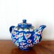 Vintage enamel ceramic teapot