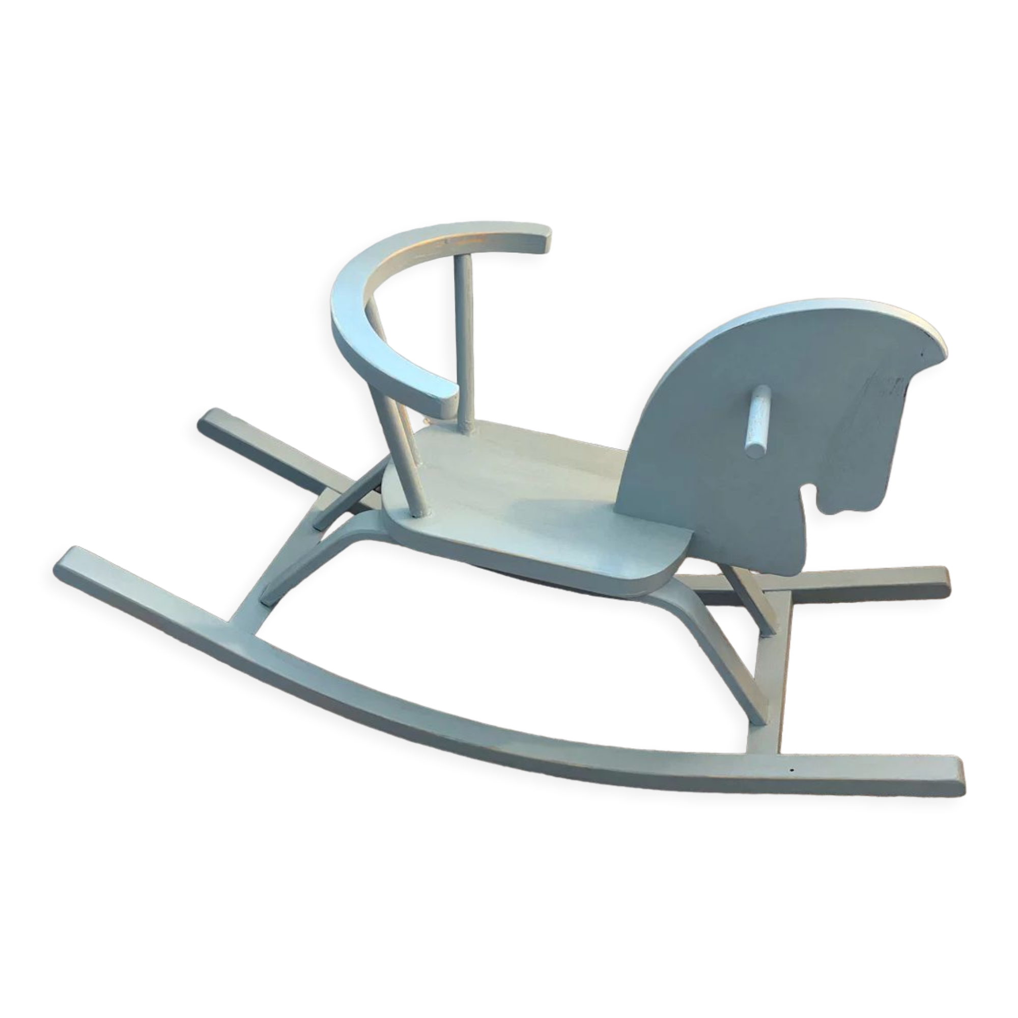 Vintage wooden rocking horse in its patina