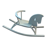 Vintage wooden rocking horse in its patina