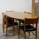 Wooden oval table and 6 matching chairs 60