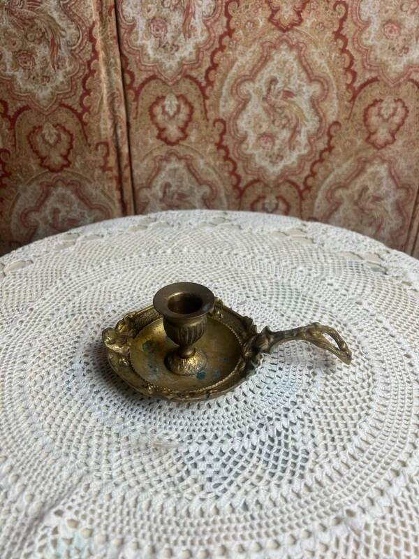 Antique gilt bronze hand candlestick