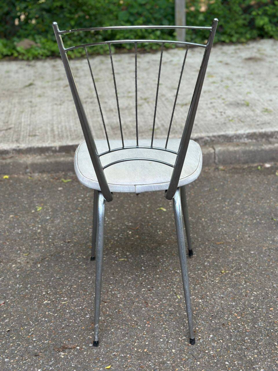 Vintage Scandinavian chair in steel and white leather from the 1950s.