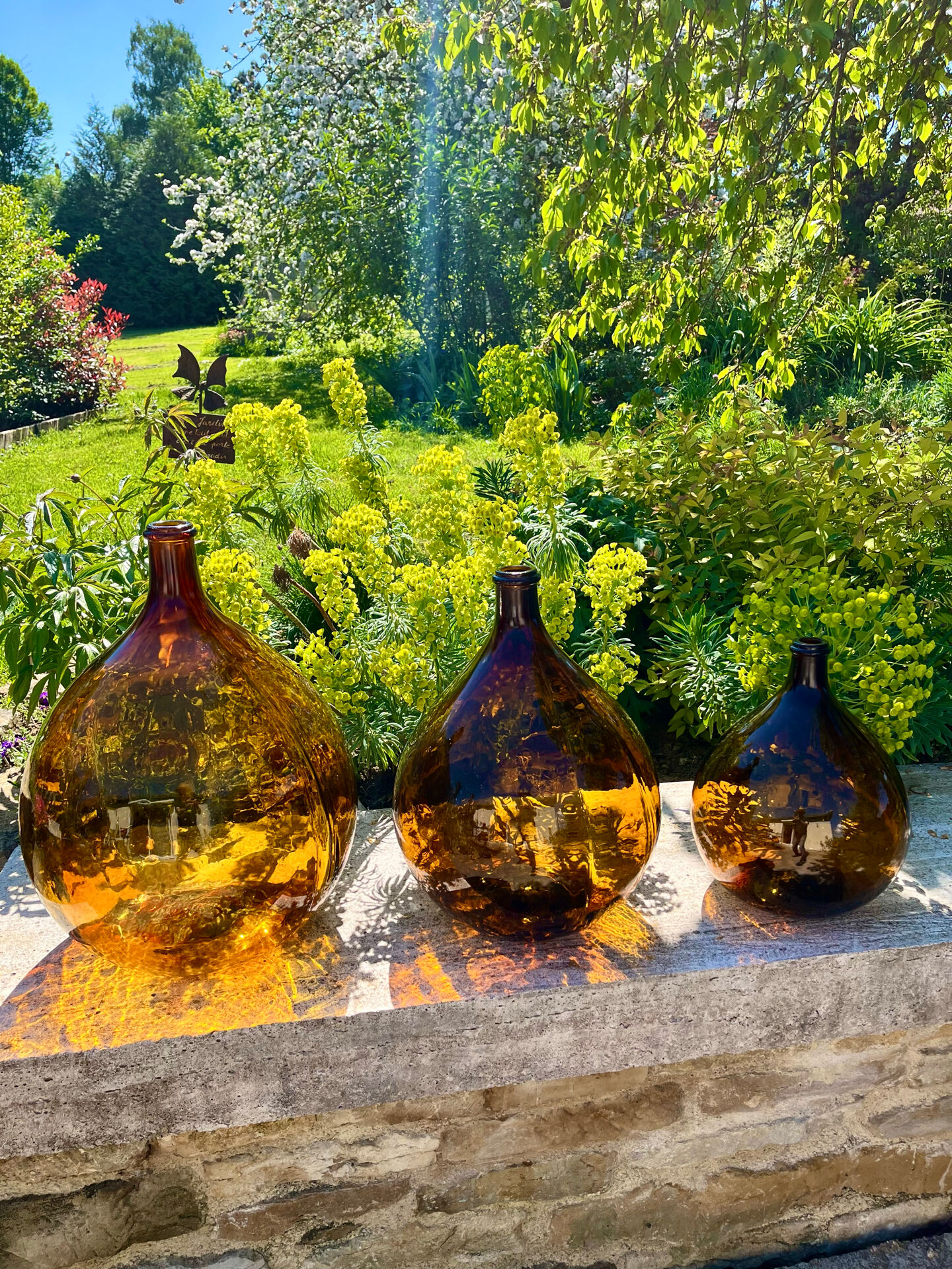 Lot de 3 dame-jeanne ambrées