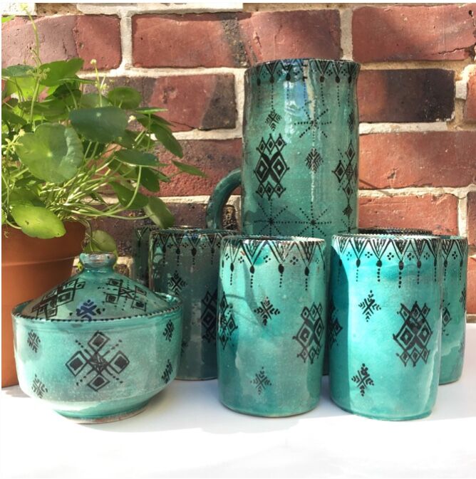 Service a orange enamelled signed former pottery