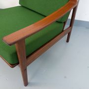 Pair of vintage Scandinavian armchairs in teak and green fabric from the 1960s.