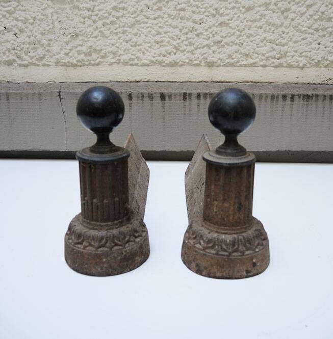 Old neoclassical style cast iron andirons
