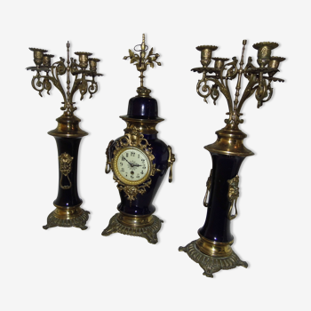 Fireplace trim, pendulum and two blue porcelain candelabra, late 19th century