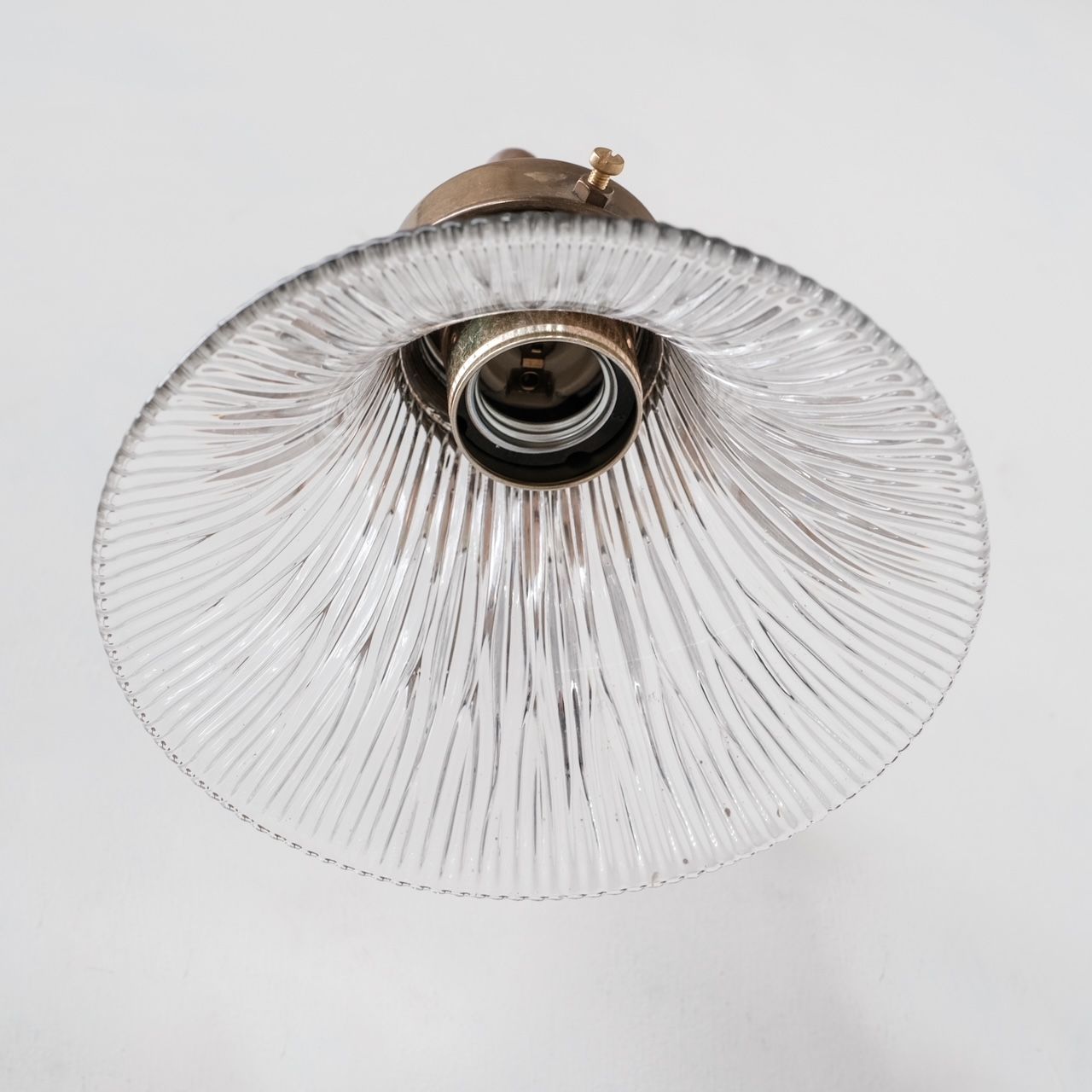 Pair of brass and holophane glass french mid-century wall lights