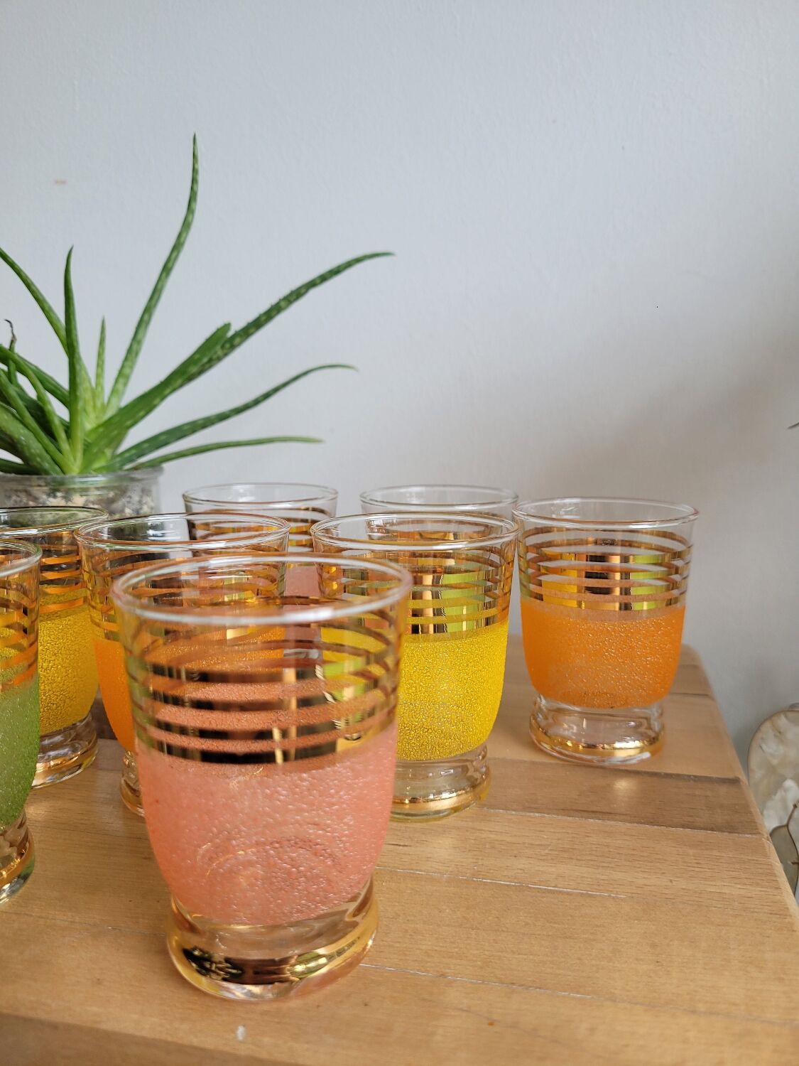 Set of 9 gilded granite glasses