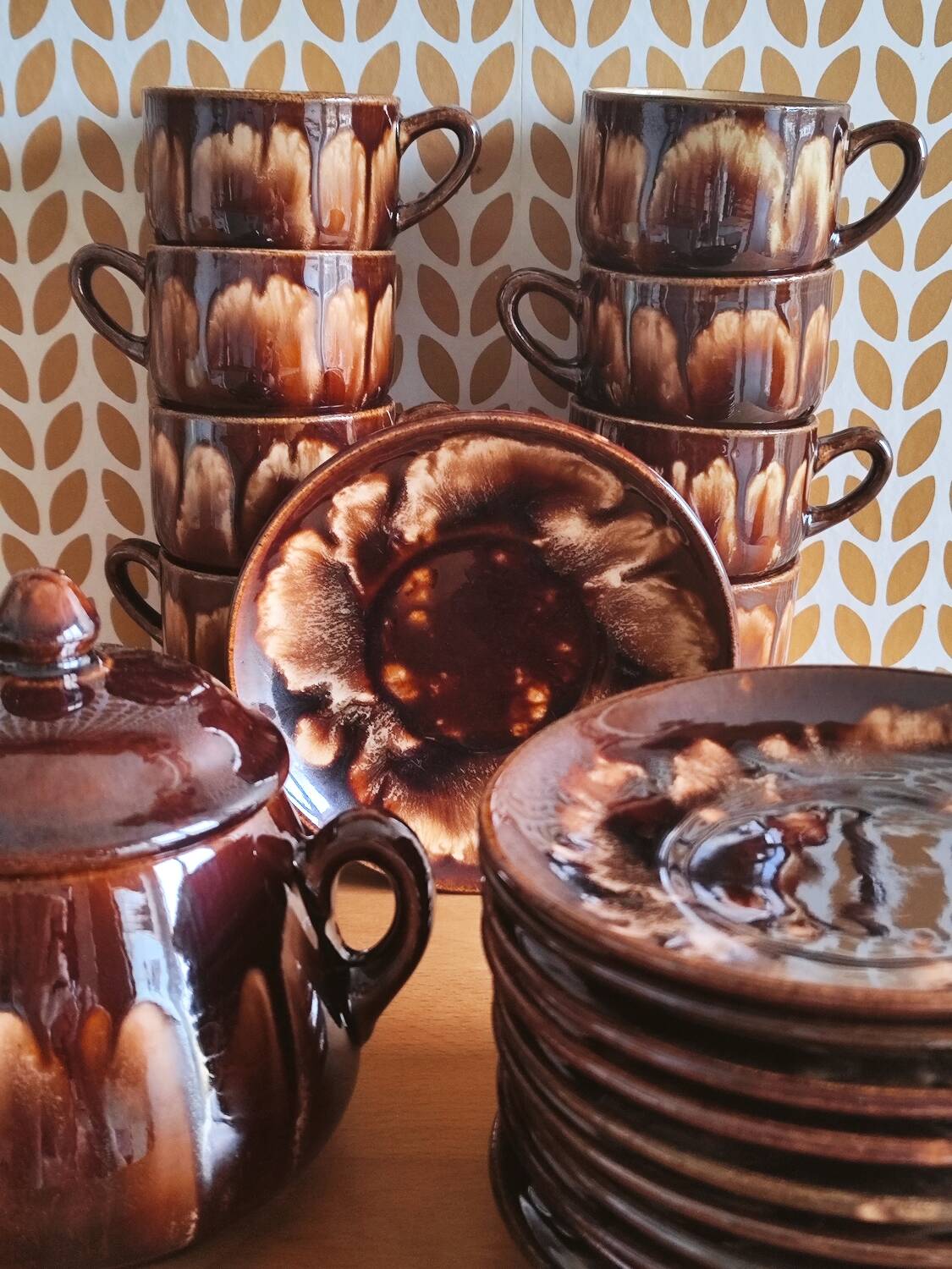 Vintage coffee service in glazed brown ceramic.