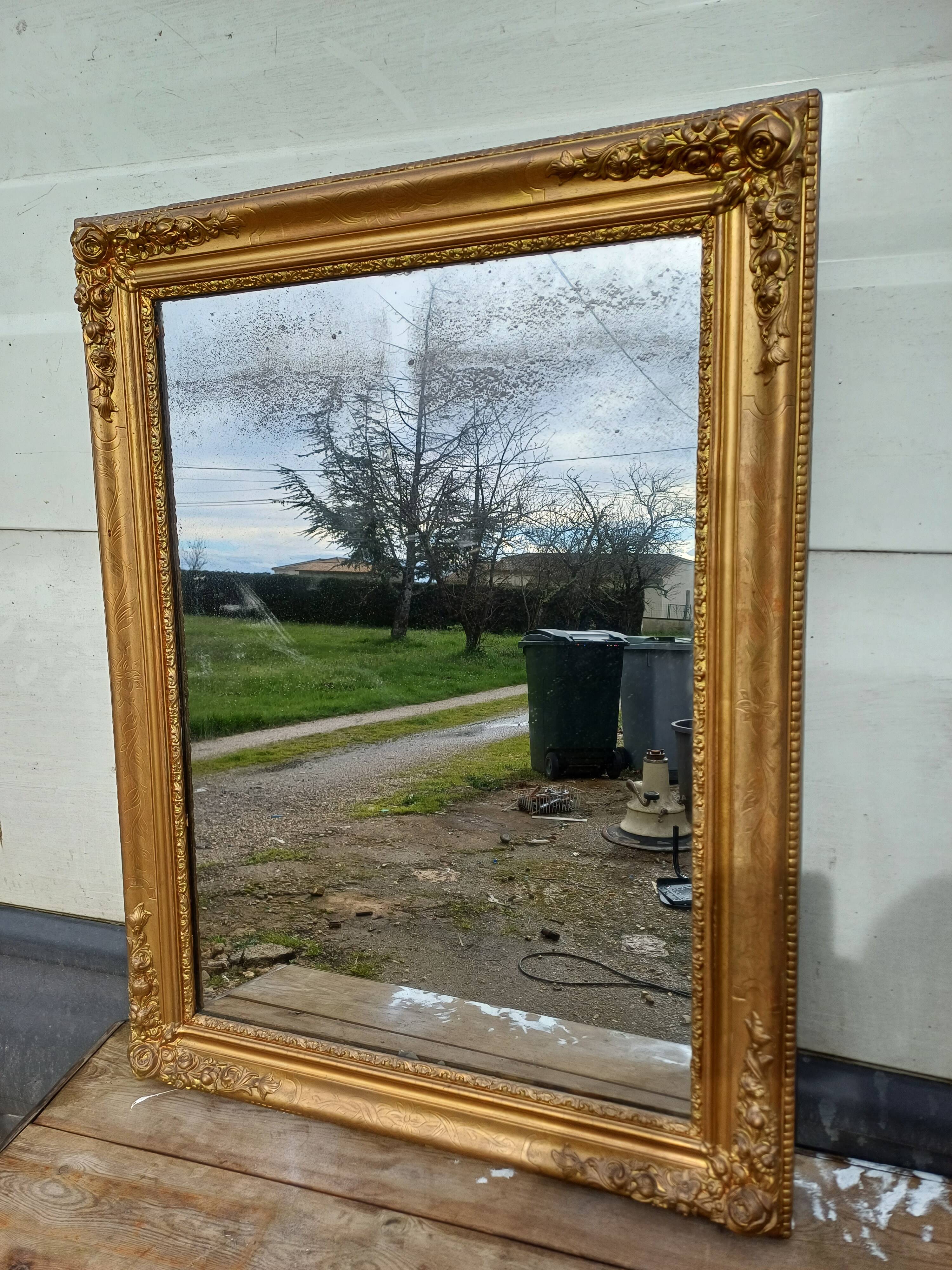 Wood mirror and golden Stuk