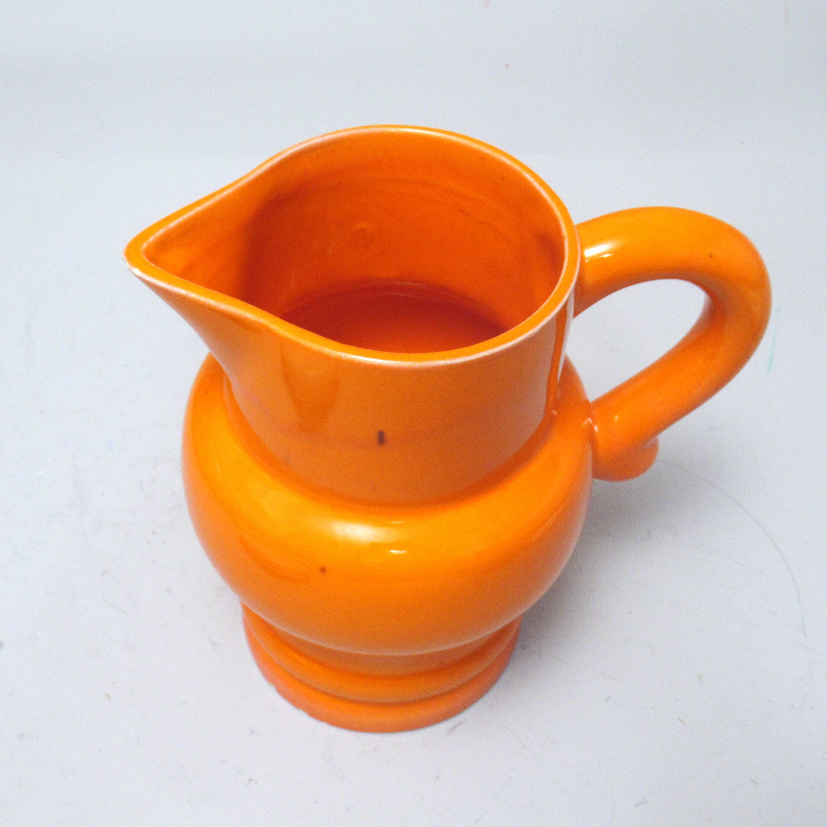 Pichet orange St Clément années 60