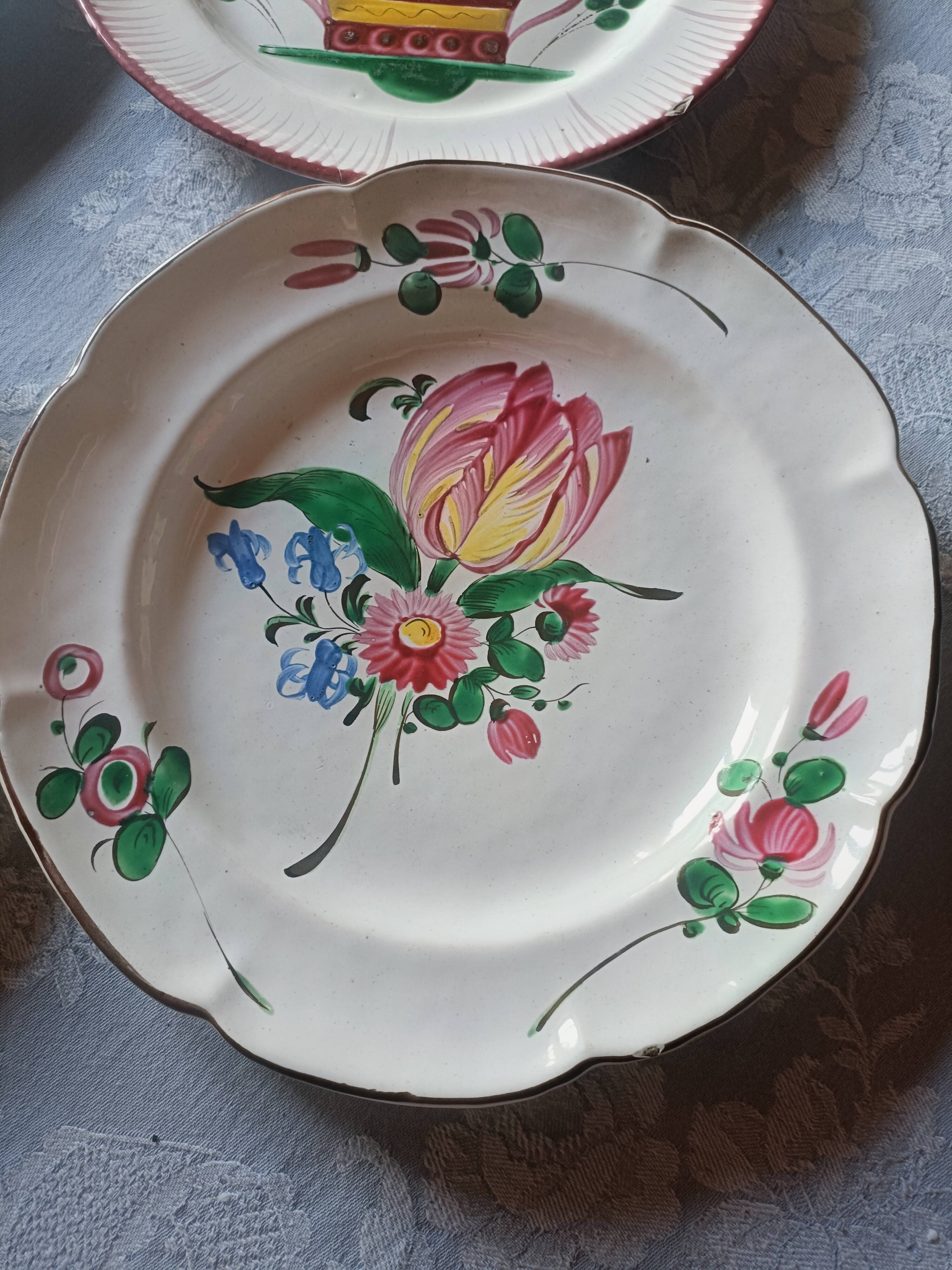 Set of 4 19th-century earthenware plates.