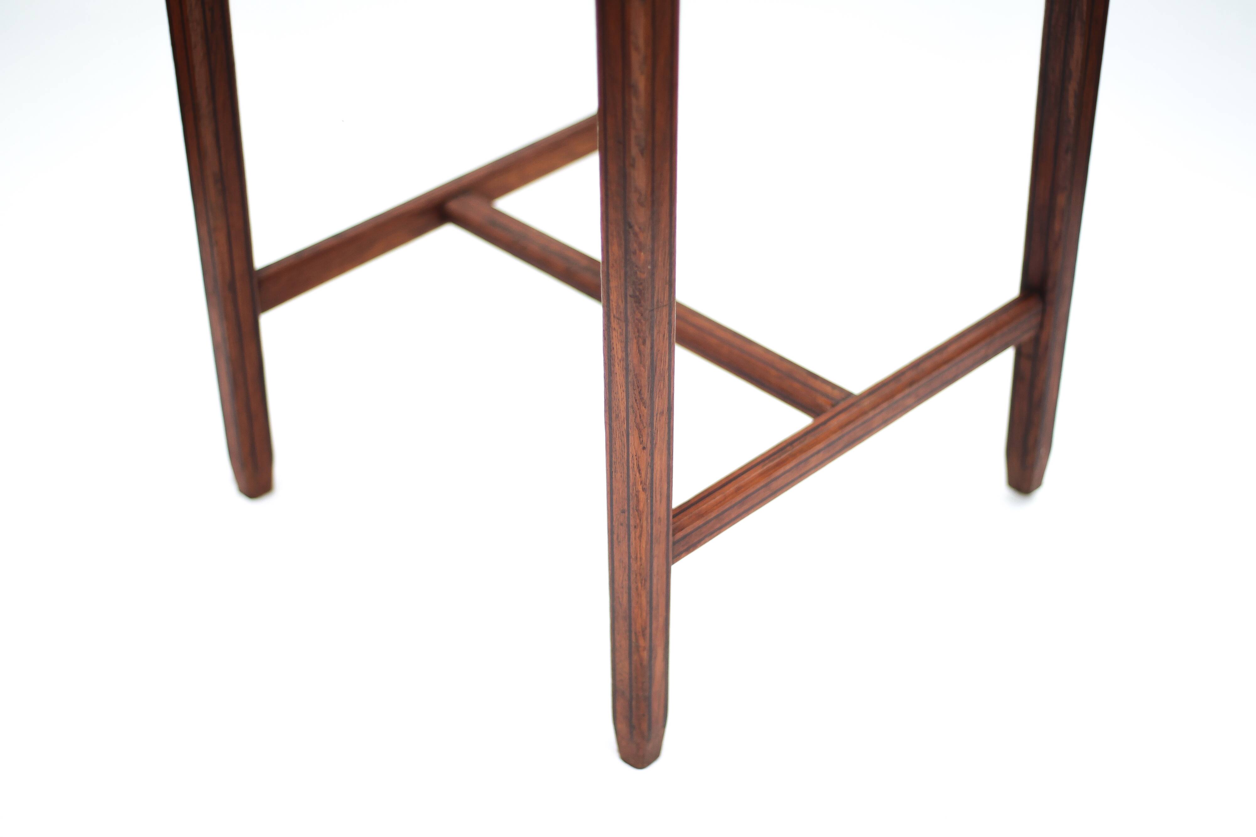 Wood table with marquetry, table with an antique parquet top, antique table.