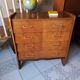 Commode vintage façade inclinée chêne
