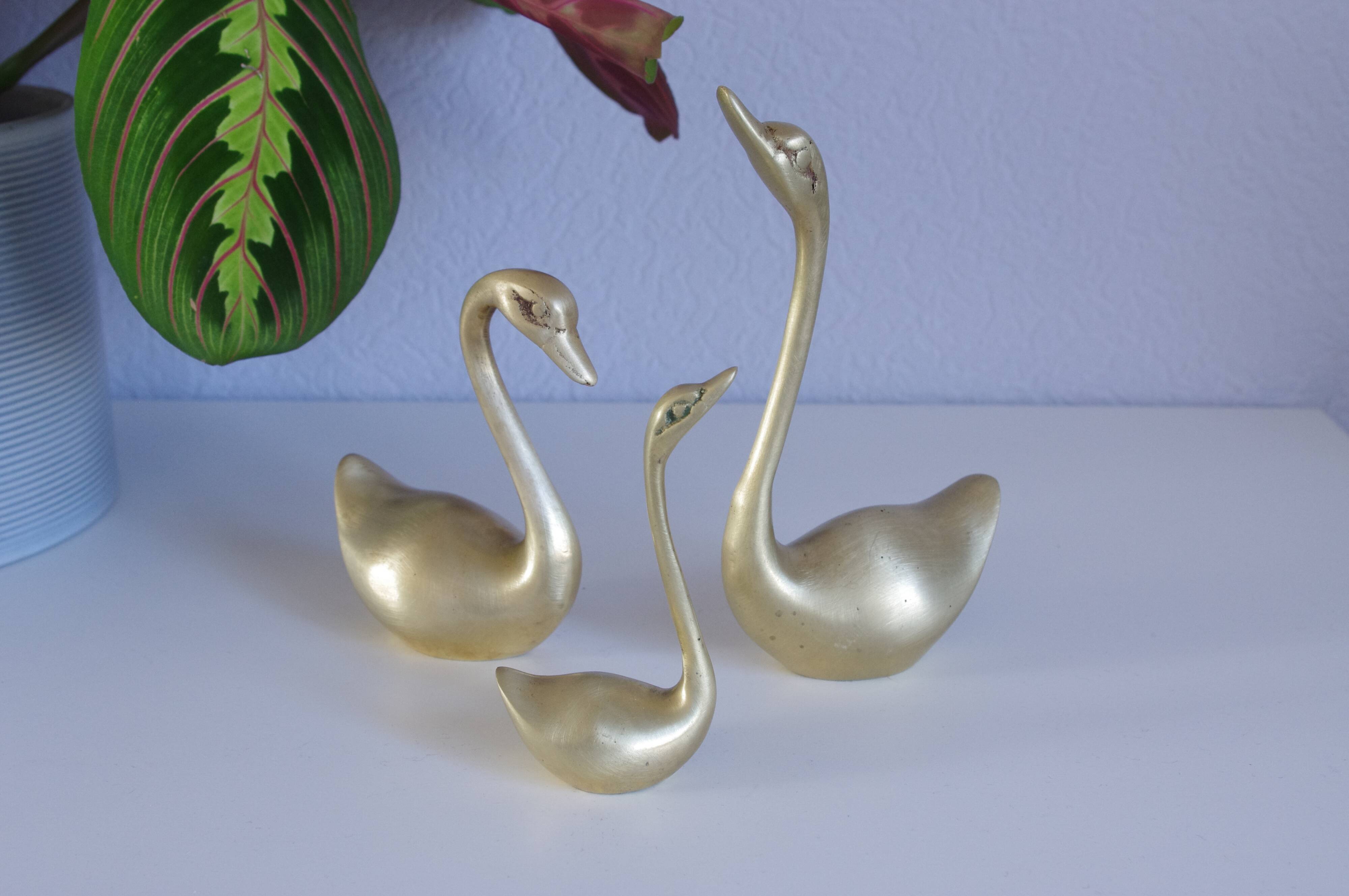 Swans or ducks brass