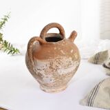 Old water jug. Gargoulette. Old terracotta pitcher.