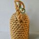 Glass bottle with braided rope, 60s