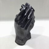 Vase with intertwined hands