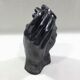 Vase with intertwined hands