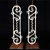Pair of decorative cast-iron lamps