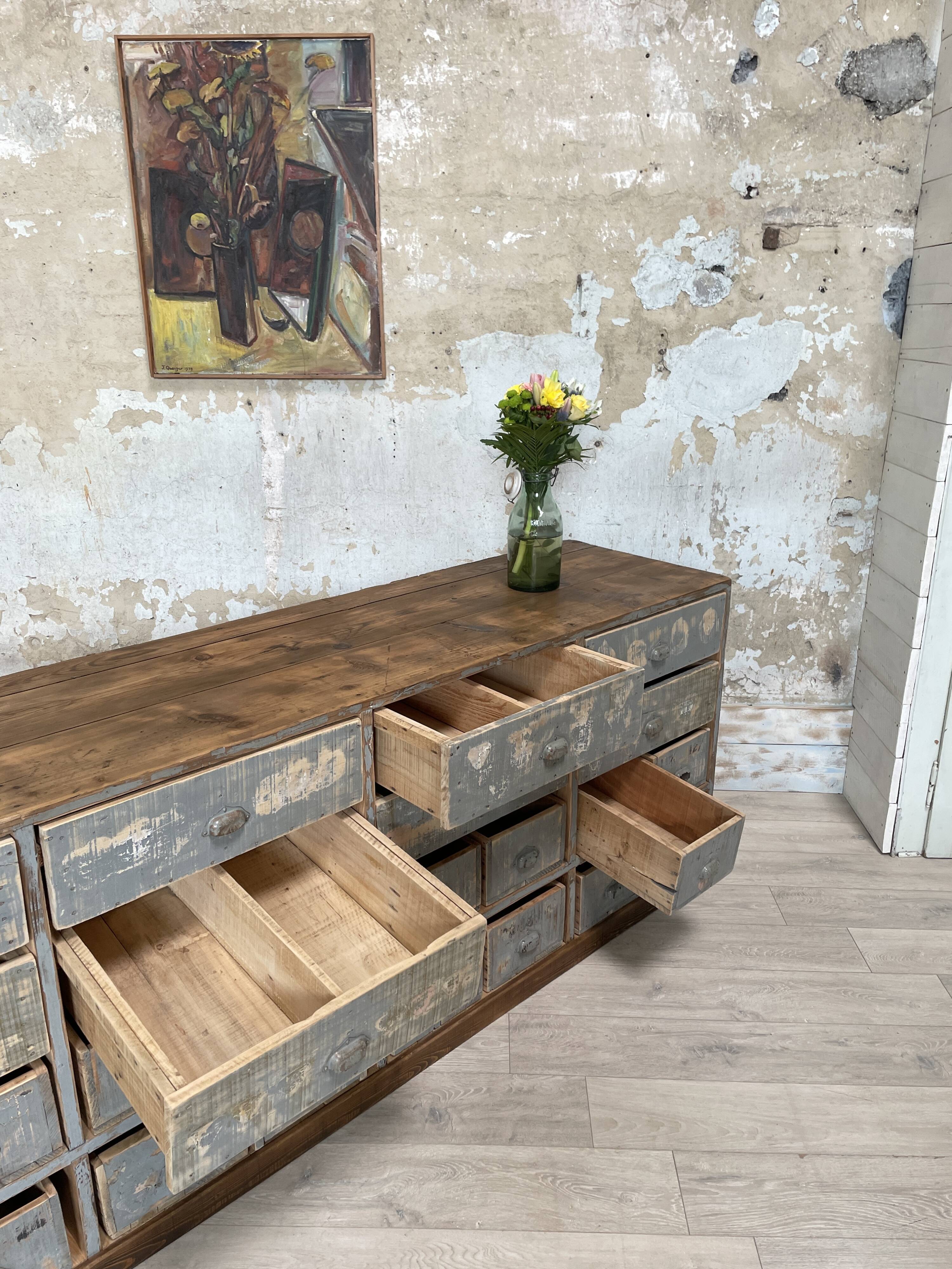 Artisanal workshop bank in patinated wood, circa 1950.