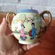 Vintage Japanese fine porcelain tea set with landscape pattern.