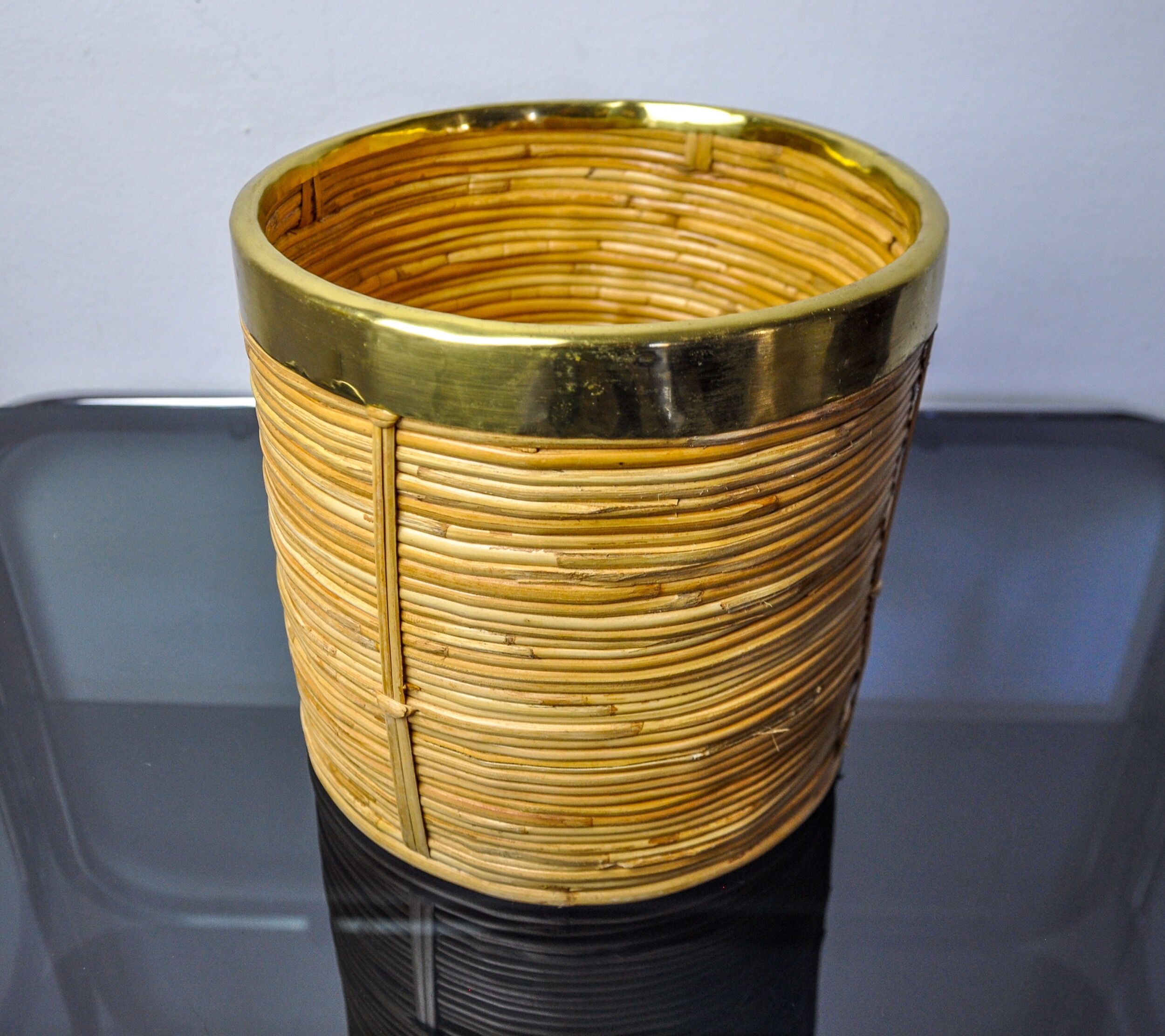 Rattan and brass book basket, Italy, 1970