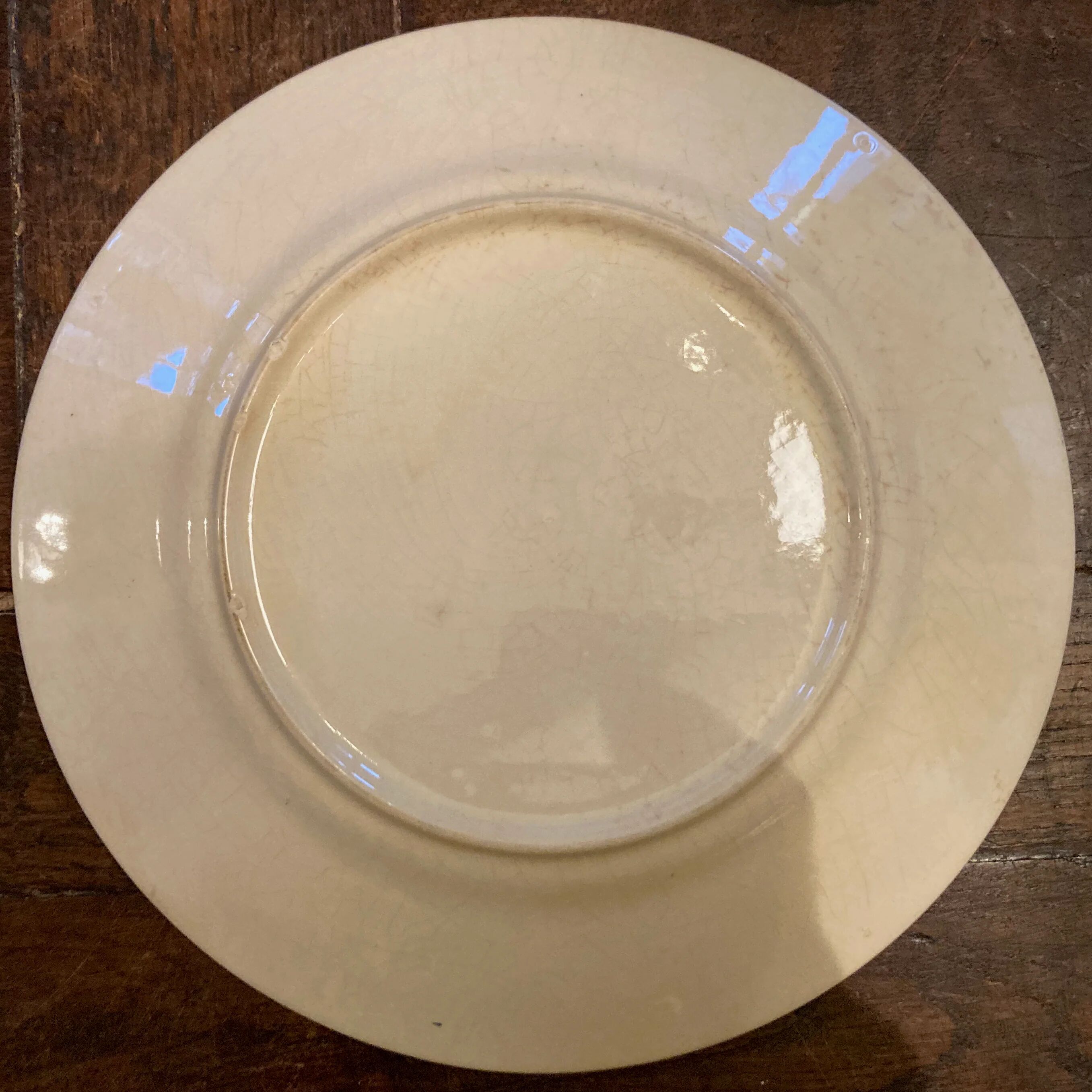 6 antique flat plates in earthenware with blue flower decoration.