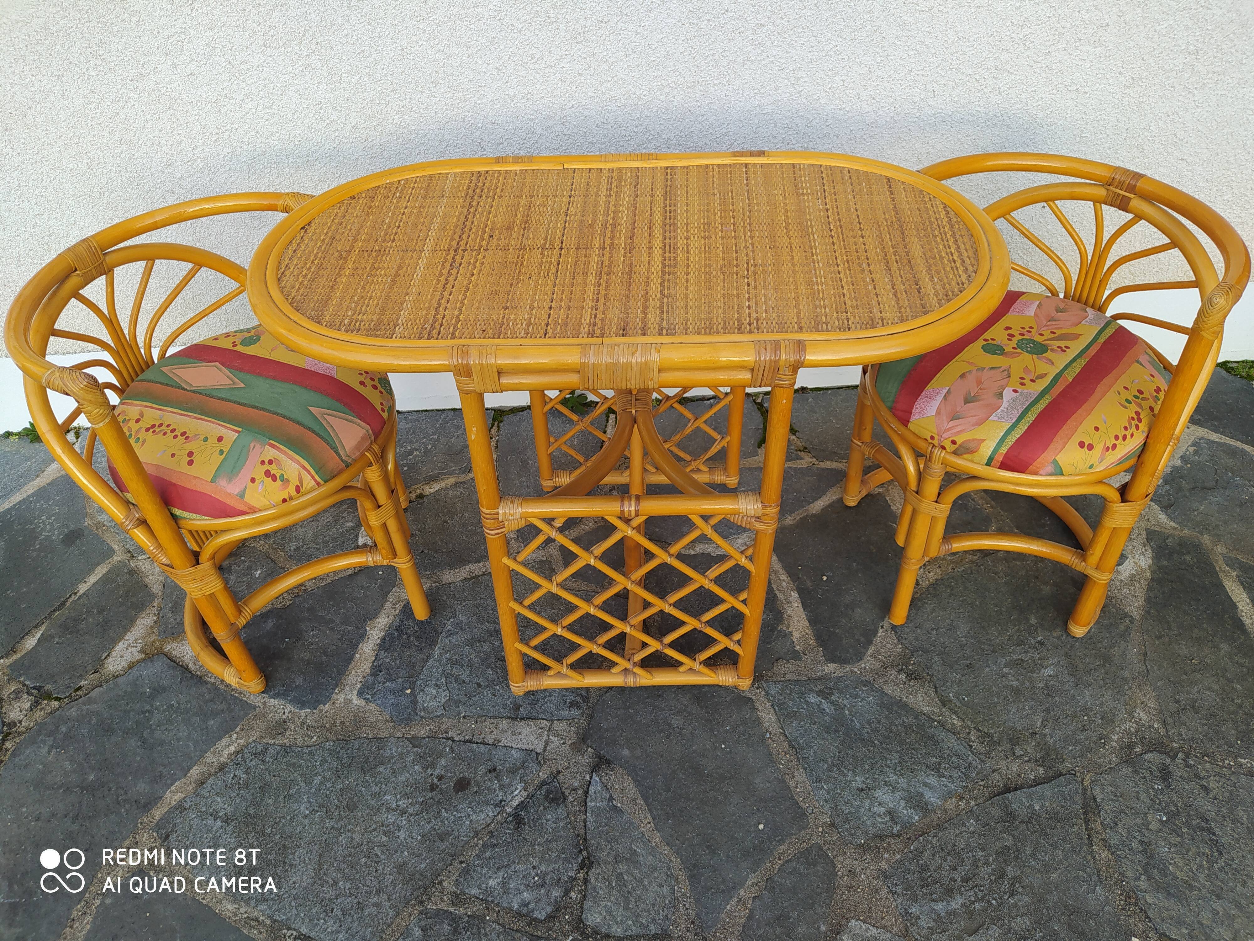 Vintage rattan tête-à-tête table with 2 armchairs