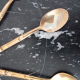 Set of 12 old brass teaspoons