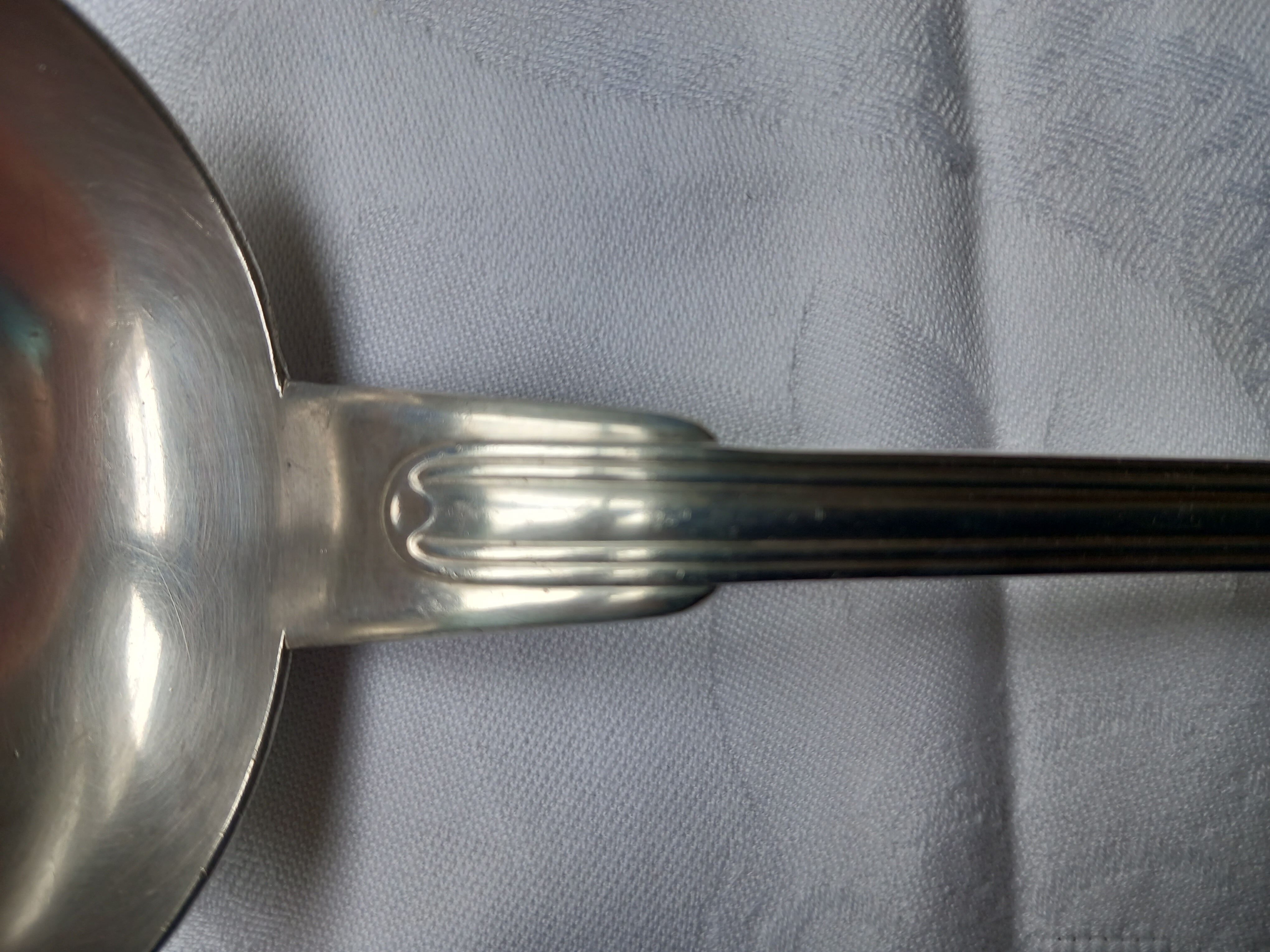 Silver metal ladle